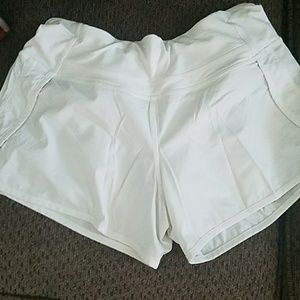 White Lululemon run shorts